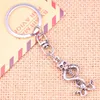 Keychains 20st Fashion Keychain 37 20 mm Skull Skeleton Wand Pendants Diy Men smycken bil Key Chain Ring Holder Souvenir för gåva