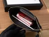 With box Leather Bag Holders Purse CLES Designer Fashion Womens Mens Key Ring Credit Card Holder Coin Purses long Wallet Charm cowhide 2024