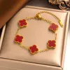 V Collier Net rouge nouveau trèfle à quatre feuilles Bracelet femme Fritillaria multiflora bonne chance trèfle à quatre feuilles bracelet en acier titane