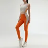 Kvinnor Färg Kollision QuickDrying Yoga Clothes Suit Gymträning samlade undertröja Lyft Höft Tight Pants 240228