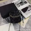 Loja de atacado de fábrica 2024 feminino na moda novo cordão mini pequeno saco de lixo com um ombro crossbody