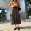 Jupes printemps automne taille haute ample décontracté plissé a-ligne jupe dames élégant mode couleur unie tout-match Vintage femmes