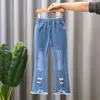 Dziewczęce dżinsowe spodnie wiosna i jesienne dziobowe spodnie na nogi Baby Girl Flashed Casual Dżinsy 412Y 240227