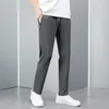 Pantaloni da uomo Pantaloni casual da uomo Cuciture tascabili rinforzate Coulisse dritta allentata con tasche elastiche in vita per tutti i giorni