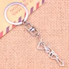 Keychains 20pcs Fashion Keychain 42 8 Mm Skeleton Man Halloween Pendants DIY Men Jewelry Car Key Chain Ring Holder Souvenir For Gift