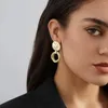 Boucles d'oreilles pendantes à la mode, pendentif torsadé irrégulier pour femmes, personnalité tempérament dames cadeaux de fête, bijoux vente en gros directe