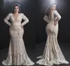 2020 Plus Size Mermaid Wedding Dresses V Neck Appliqued Beaded Long Sleeves Bridal Gowns Sheer Back Ruffle Sweep Train Vestidos De5980901