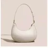 Bolsa de saída da loja nas axilas outono e inverno novo nicho francês luz luxo crescente minimalista vara mão ombro feminino com uma sensação de