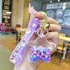 2024 Nightlight Liquid Keychain Creative Flowing Sand Bottle Keychain Women's Bag Pendant Car Keychain Small Jewelry Cute Gift