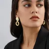 Boucles d'oreilles pendantes à la mode, pendentif torsadé irrégulier pour femmes, personnalité tempérament dames cadeaux de fête, bijoux vente en gros directe