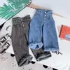 Pantaloni larghi per bambini Autunno Inverno Personalità Moda Ragazze Jeans a vita alta Elastico in vita Tasca con bottoni Casual 240227