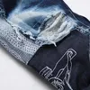 2024 nova marca de jeans dos homens alta rua retalhos buraco jeans azul remendo calças moda tendência calças jeans