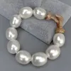 YYGEM Bracelet en forme d'oeuf de perle de coquillage blanc Cz fermoir pavé 8.5 240305