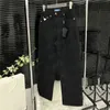 Metalowa odznaka dżinsowe spodnie projektantka mody Lady Proste Pants Hiphop Spoders Streetwear