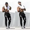 Män kroppsbyggande tank tops gymträning fitness bomull ärmlös skjorta som kör kläder stränger singlet manlig sommar avslappnad väst 240304