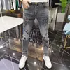 Jeans masculinos high-end europeu coreano fino ajuste com tigre diamante impressão para desgaste casual primavera outono estiramento roupas de luxo homens