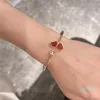 fashionable and minimalist three heart open bracelet with 18K rose gold inlaid diamond mother-in-law petal bracelet for women