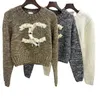 여자 스웨터 디자이너 23 가을/겨울 고품질 바람의 둥근 목 롱 슬리브 짧은 니트 풀오버 스웨터 패션 절묘한 TTCO