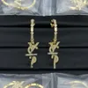 Kolczyki projektanta marki 18K złoty plisowany Wysokiej jakości luksusowe kolczyki stadniste litera luksusowe kółko dla kobiet projektantki mody biżuteria