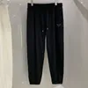 Pantaloni da sci da uomo in pile tecnico allentato estivo di design Pantaloni da jogging in cotone satinato Pantaloni da jogging da uomo Pantaloni da corsa traspiranti resistenti alle rughe