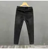 Herren Jeans Designer Black Stone Grinder Washed Tear Hole Europäischer Herbst/Sommer 2023 Neue Modemarke Elastic Slim Fit Kleine gerade Ärmel HSVE