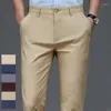 Pantalones para hombres Estiramiento masculino Sólido Negro Pantalones casuales inteligentes Oficina Traje de secado rápido Primavera Otoño Coreano Recto