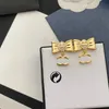 Luxe boog vergulde oorbellen Womens Boutique sieraden Coppe Designer merk sieraden oorbel hoge kwaliteit met stempel oorbellen