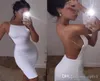 Vestidos de fiesta de cóctel con correas de cristales sin espalda sexy Nuevo 2019 Barato En stock Imagen real Corto Negro Blanco Niñas Vestido ajustado Prom 4058823