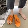 Designer Sandaler Top Woody Women's Mule Flat Slippers Light Brown Beige White Black Pink Blue Lace Letter Canvas Slippers Women's Summer utomhus inomhusskor