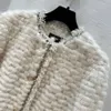 ترقيع مع معطف فراء شتاء الشتاء الجديد للنساء وينينينغ 2023