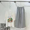 Dongmen Korean Fashion Set z krótkim rękawem dla kobiet Summer Nowe luźne design Casual Gread Nets Pants Dwuczęściowy modny