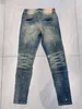 Paarse merkjeans Amerikaanse high street jeans met moddergele wassing