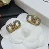 Marca de designer de moda Gold Bated Gold Stud Brand Crystal Rhinestone Brincho para mulheres Brincos coreanos jóias