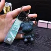 New resin transparent music bear keychains creative car bag lovers key chain small pendant wholesale 2024