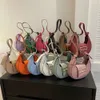 Fabricants de sacs à main en gros et au détail cette année, populaire pour les femmes, été minimaliste, nouveau style 2024, tendance des aisselles pour femmes, sac à boulettes à une épaule à la mode