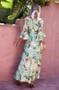 Casual klänningar 2024 Kvinnor som skriver ut lång maxi klänning V-ringning Petal Sleeve Beach Robes Oregelbunden längd Wrap Floral Holiday Vestidos