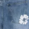 Jeans de jeans pour hommes en jean américain européen hip-hop sombre et excentrique Personnalité de short en jean imprimé de style sombre et excentrique