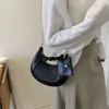 Fabricantes bolsa atacado e varejo 2024 nova edição de moda com textura wtern pu simples feminino cor sólida corrente axilas saco