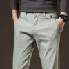 Printemps hommes mince pantalons décontractés élastique coton lisse respirant mode coréenne affaires travail pantalon noir kaki vert 240305