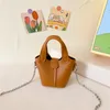 Moda Bambini borse a secchiello per bambini colore caramella borsa a tracolla in pelle PU ragazze catena di metalli spalla singola Cestino di verdure Z7089