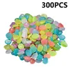 Gartendekorationen 300pcs wiederverwendbares Glühen in den dunklen Kieselsteinen Aquarium Blumentöpfe Outdoor -Pfad Wasserlager Pool Künstlicher Vase -Füllstoff