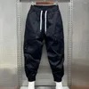 Pantalon pour hommes, taille élastique, sarouel respirant et confortable avec plusieurs poches à la taille pour l'extérieur