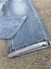 Jeans da donna 2024 Primavera Donna Vita alta dritti elasticizzati da donna Fori Pantaloni in denim corto con cerniera effetto consumato