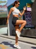 Roupas de shorts de ioga feminina com exercício Fitness Wear calça curta meninas que executam bolsos elásticos de roupa esportiva
