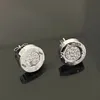 Boucles d'oreilles en or CNCV gâteau rond noir et blanc léger luxe personnalité masculine et féminine couple célébrité en ligne avec version haute de bijoux d'oreille.