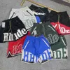 Projektant Krótka moda odzież Casual Cailing Shorts Wysoka wersja Rhude litera haftowana siatka przycięta Rainbow Mens Women Sanitary Spods 3M Anti Amer Dmiu