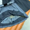 Mini jupes d'été Sexy avec Badge classique, taille haute, robe trapèze pour femmes, jupe plissée avec ceinture, robes plissées de Style collégial