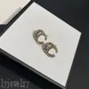 Punk dame luxe heren stud oorbellen voor tienermeisjes trendy tiktok gedraaide stijl letters g kristal metaal straat oorbellen mode sieraden designer oorbellen ZB034 I4