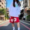 デザイナーのデニムテアーズ男女ファッションサマー服トラックスーツカポックショートパンツ正しいエディションフォームプリントインアメリカンハイストリートドローストリングハーフガードパンeoxn