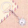 Porte-clés 20pcs mode porte-clés 28x25mm Sun Sunburst pendentifs bricolage hommes bijoux voiture porte-clés porte-anneau souvenir pour cadeau